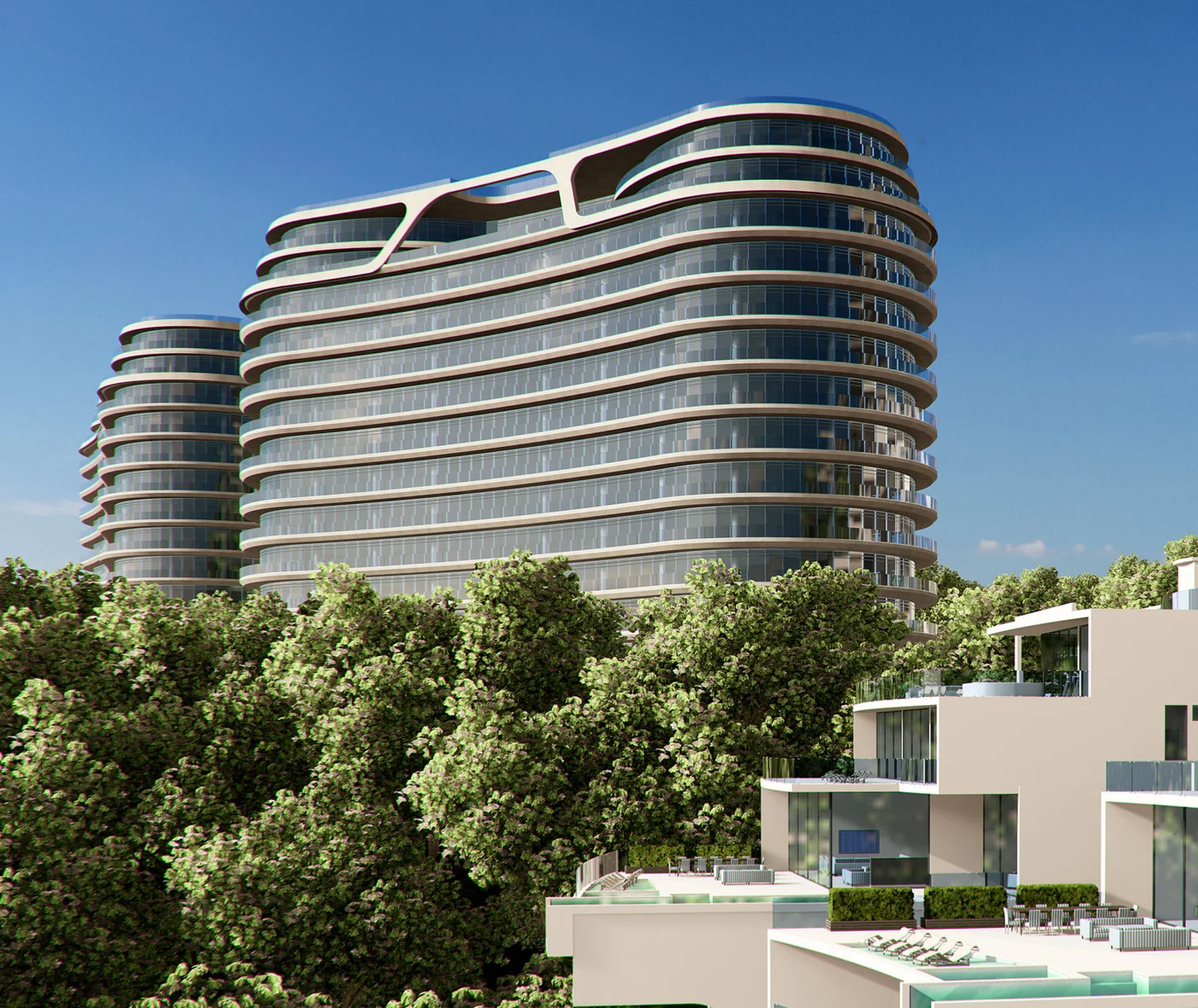 Curved residential tower above hillside villas